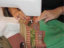 Solveig sewing a bag - Upcycled Baggage
